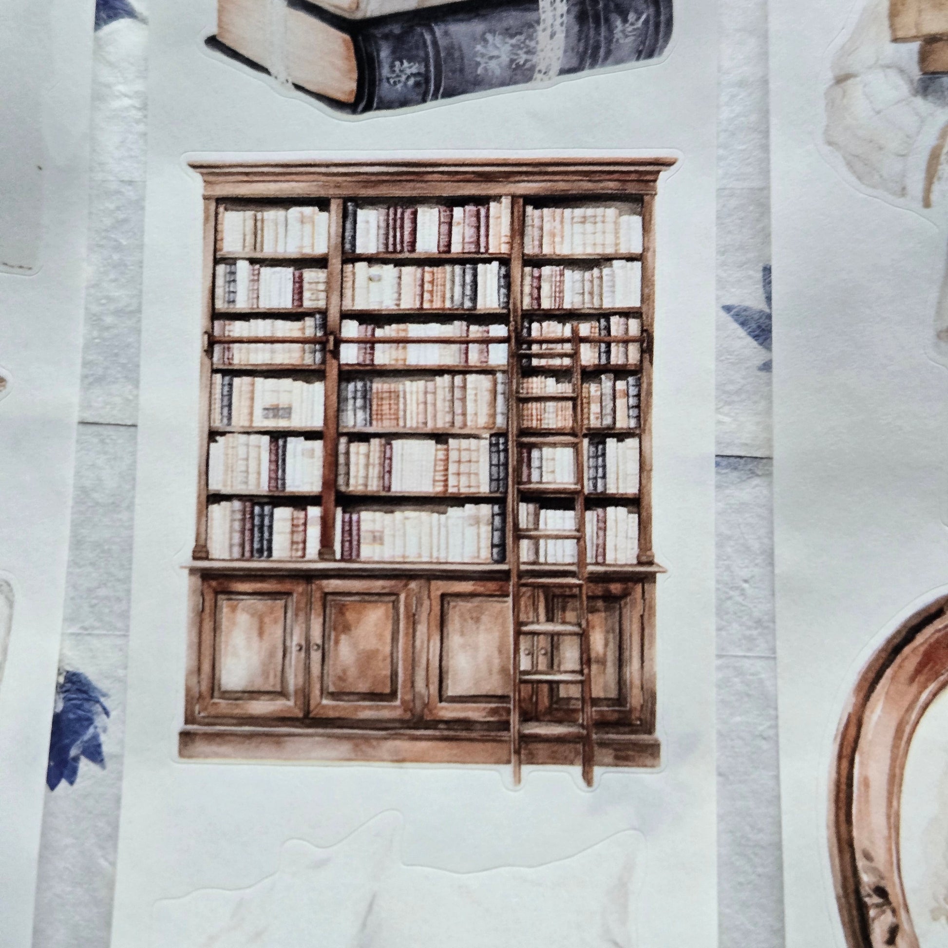 Wooden bookshelf with books on a textured surface