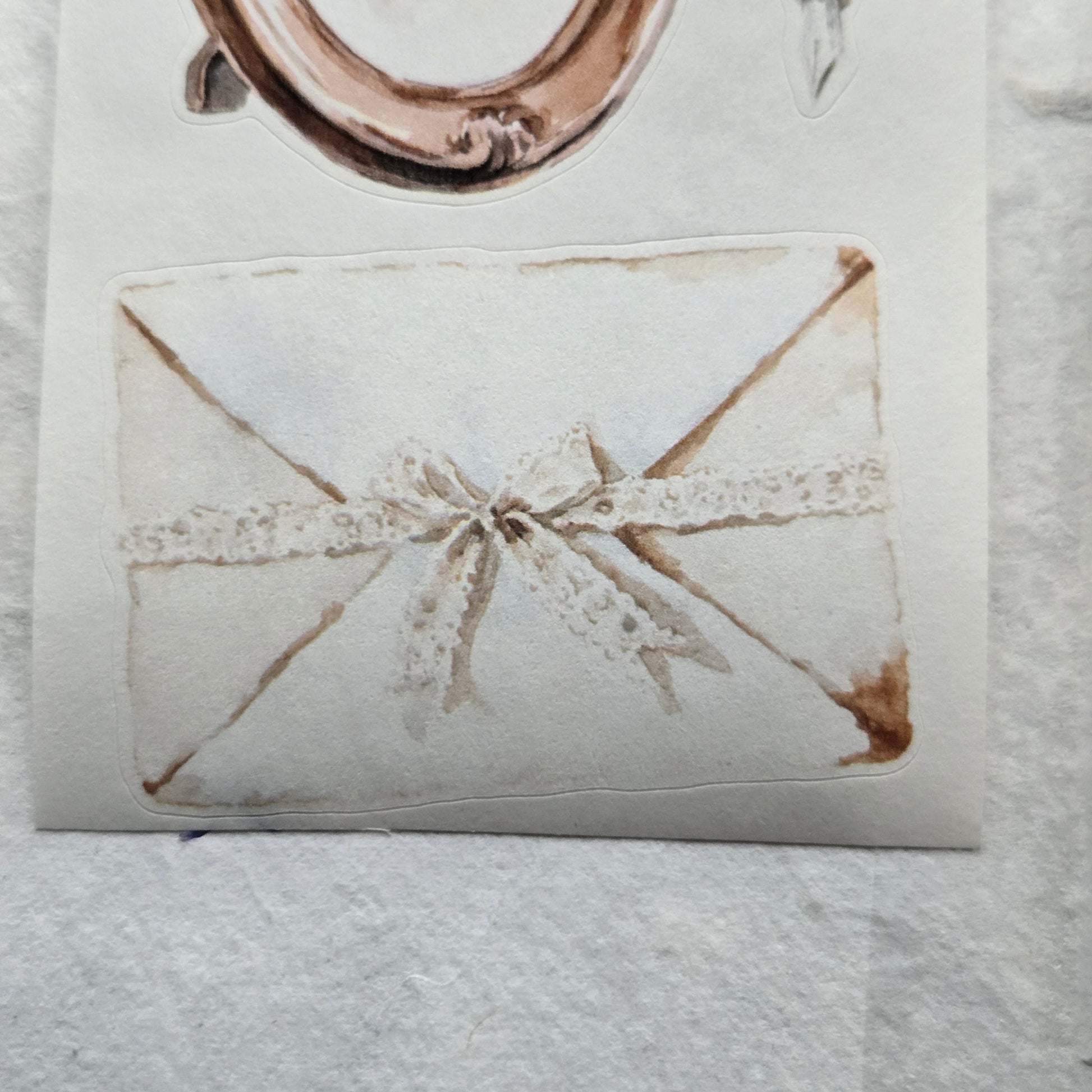 Decorative tile with star pattern on a textured white surface