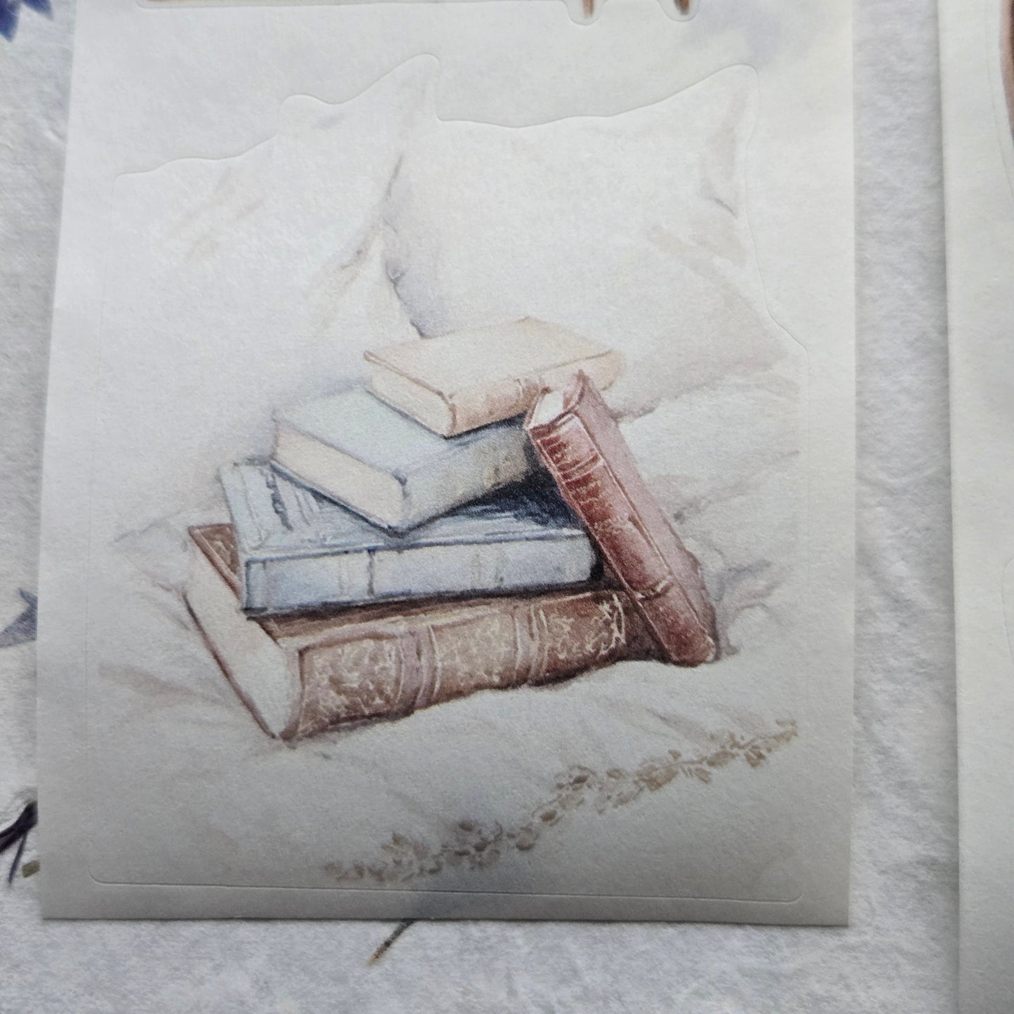 Illustration of a stack of books on a textured surface