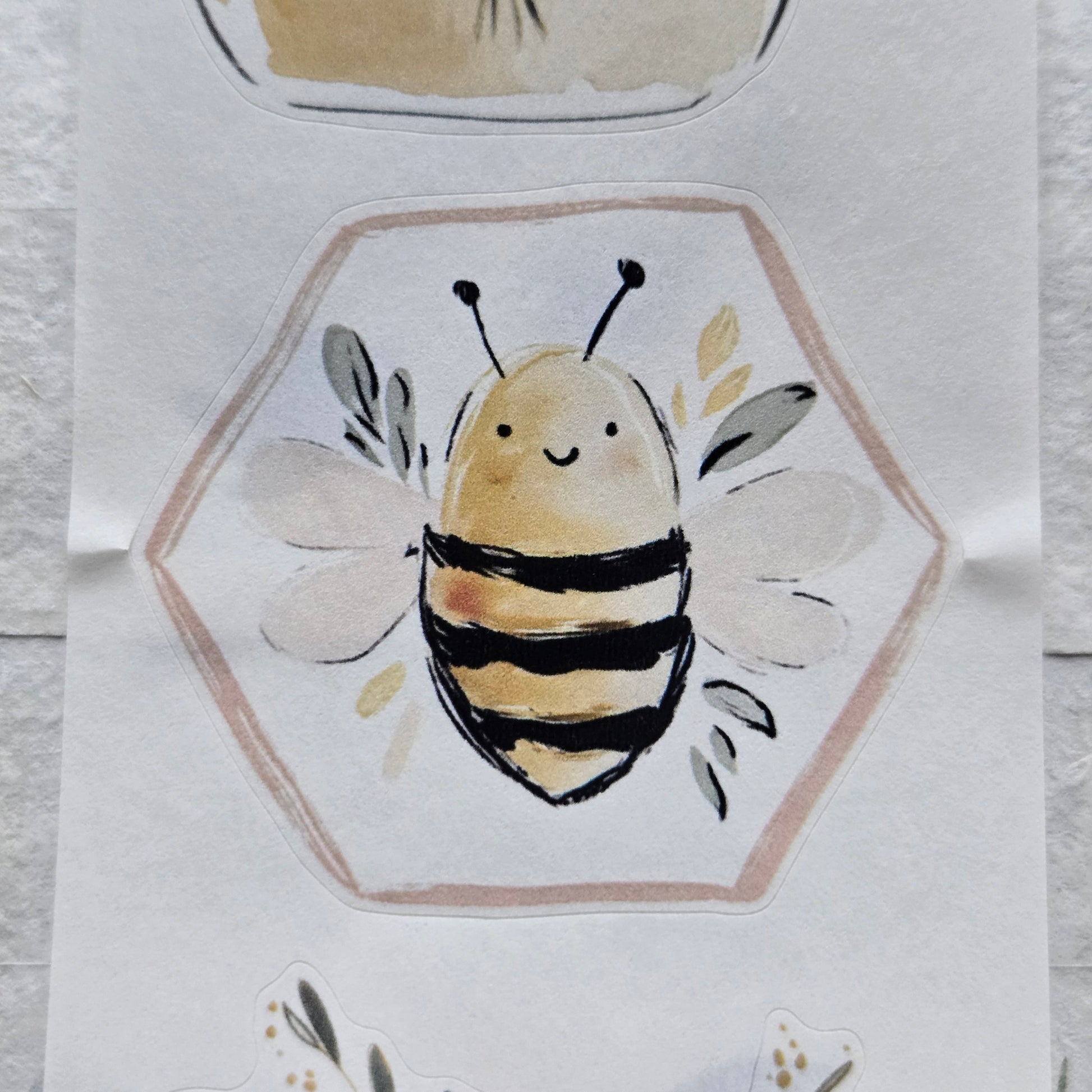Illustration of a bee in a hexagonal frame on a textured white background