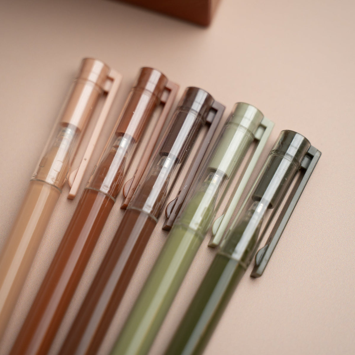 Five Archer & Olive Layered Lands gel pens in coordinating earth tones