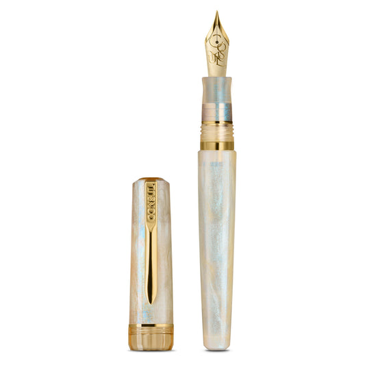 Consul Origin fountain pen in Alabaster, a pearly resin with blue and green shimmer, gold trim and a gold-tone JoWo nib, shown uncapped