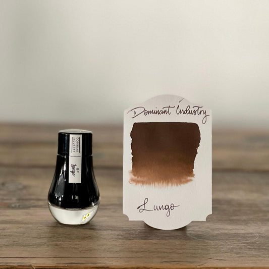 Dominant Industry Lungo No. 116 fountain pen ink bottle with warm coffee brown ink swatch