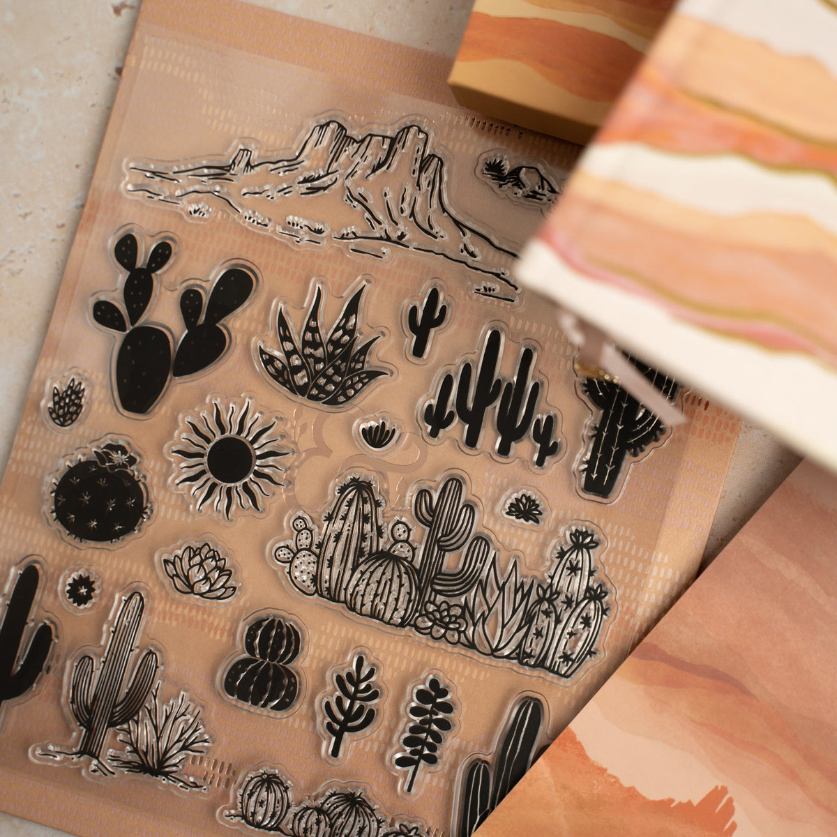 Archer & Olive Layered Lands acrylic stamp sheet with canyons, cacti, and native plants