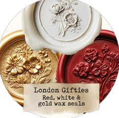 Three wax seals in red, white, and gold with floral designs on a circular background.